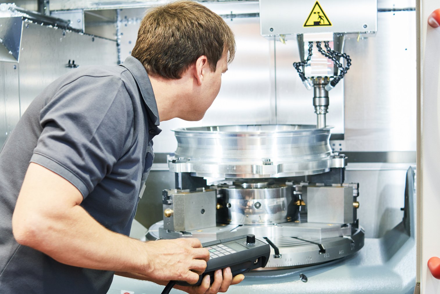 Worker Operating Cnc Milling Machine